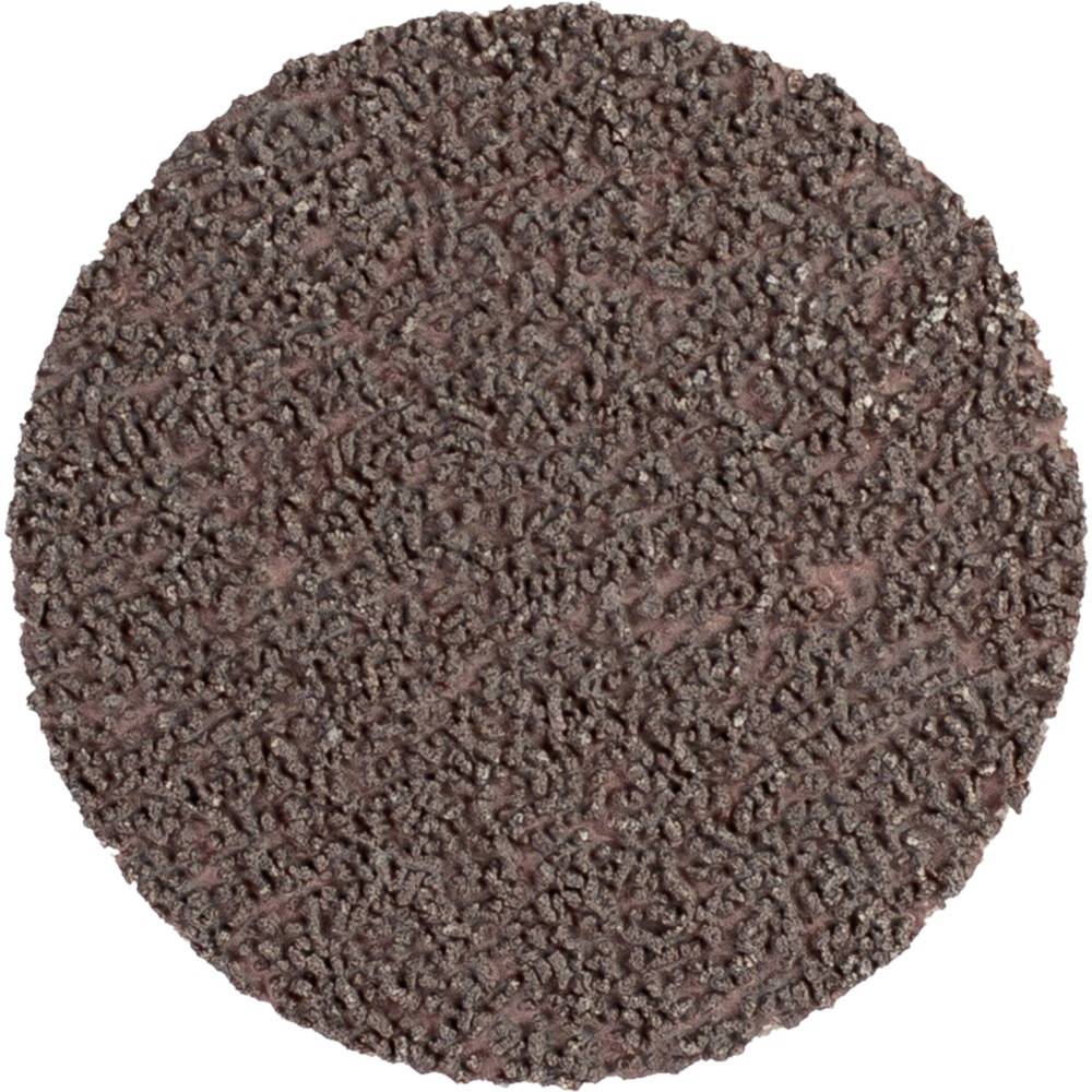 Okrągła tarcza szlifierska o chropowatej, ziarnistej powierzchni, używana do szlifowania i wygładzania materiałów.