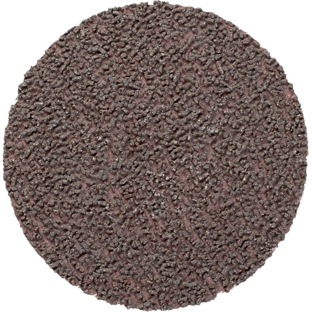 Okrągła, brązowa, teksturowana powierzchnia podkładki ściernej używanej do wygładzania i polerowania materiałów.