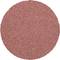 Okrągły, czerwonobrązowy element ścierny o chropowatej, ziarnistej powierzchni, przeznaczony do narzędzi stosowanych w obróbce metalu lub drewna.