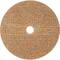 Brązowa okrągła tarcza szlifierska z otworem pośrodku, leżąca na białej powierzchni.