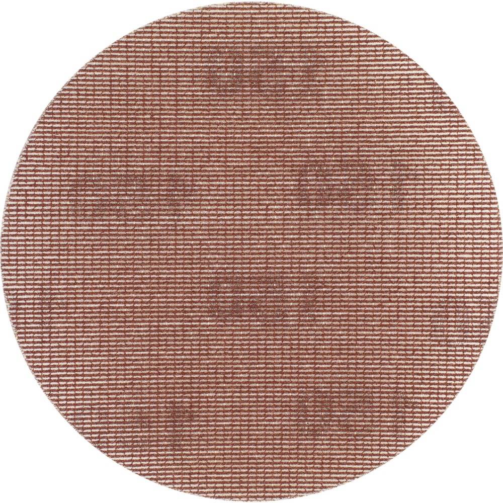 Brązowy puder równomiernie rozmieszczony w okrągłym kształcie.