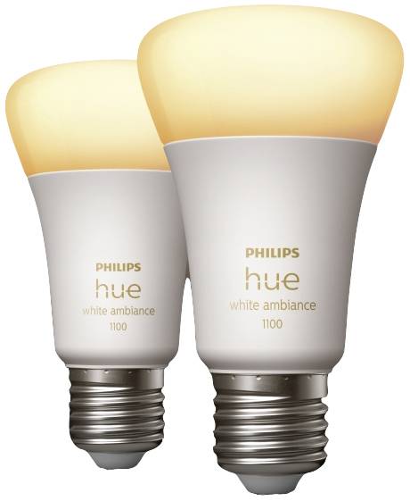 Dwie żarówki Philips Hue White Ambiance z gwintem E27. Oświetlają ciepłym białym światłem, idealne do inteligentnego sterowania oświetleniem.