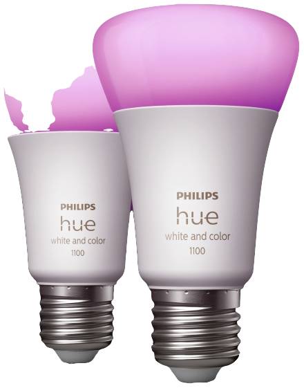 Dwie inteligentne żarówki Philips Hue, jedna świeci się na różowo. Tekst na żarówkach: 'hue white and color 1100'.