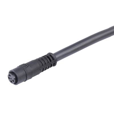 Czarny, wielożyłowy kabel zakończony okrągłym, wielostykowym wtykiem, przeznaczony do podłączania urządzeń elektronicznych.