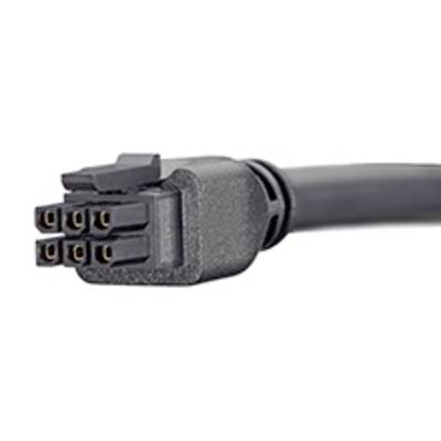 Czarny, sześciobiegunowy elektryczny wtyk widoczny jest do podłączenia różnych urządzeń i kabli.