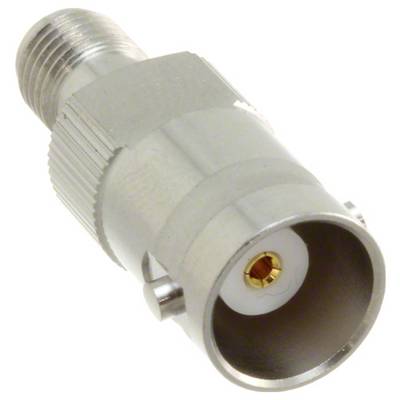 Srebrny konektor kablowy typu coaxial z gwintem na końcu i cylindrycznym otworem, używany do podłączania kabli w urządzeniach elektronicznych.