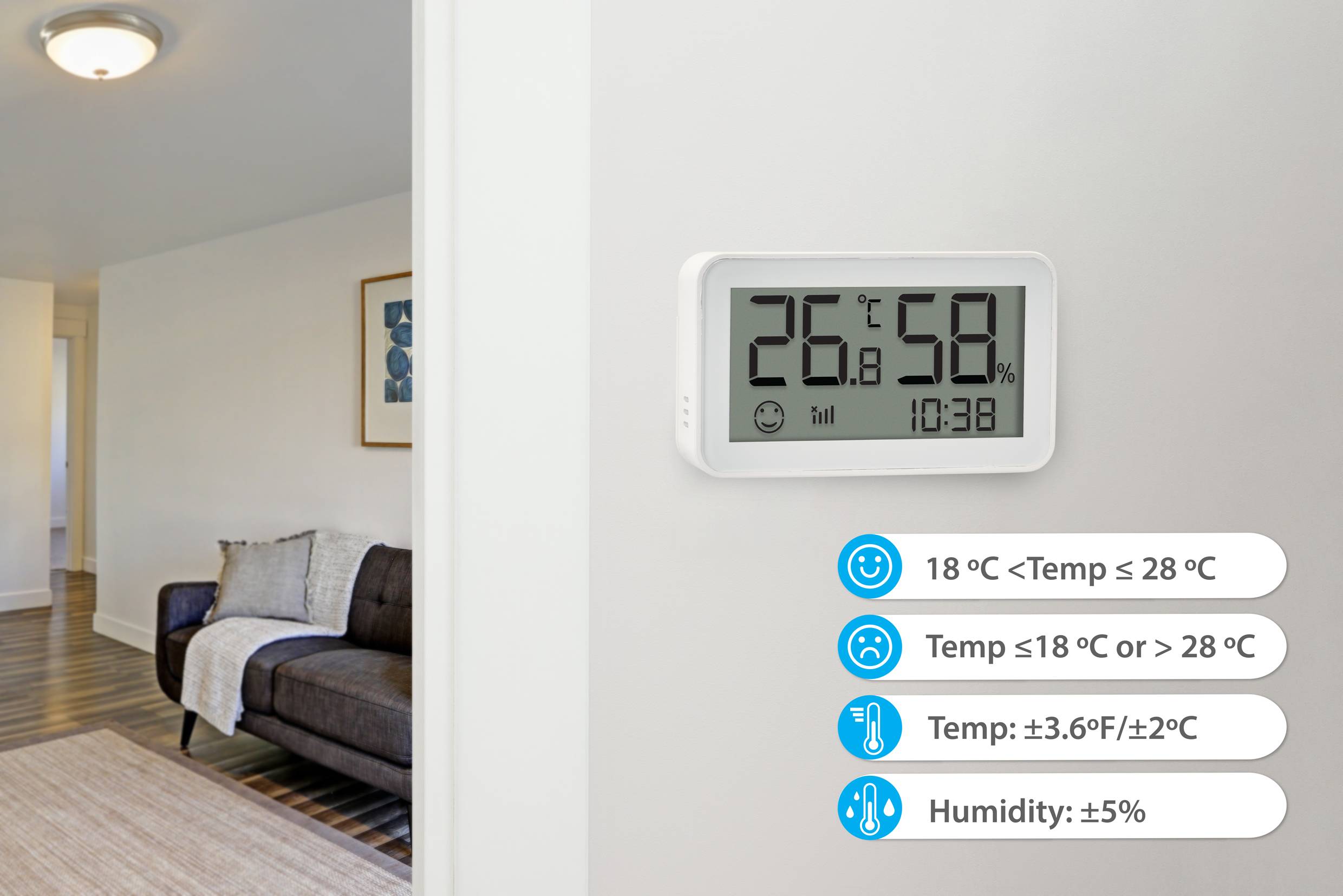 Termometr na ścianie wskazuje 26,6°C i 58% wilgotności. Obok po prawej stronie znajdują się zalecenia dotyczące komfortowego poziomu temperatury i wilgotności.