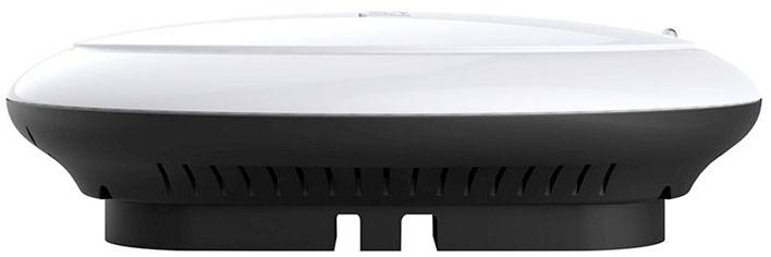 Biały, okrągły router WiFi z czarną podstawą.