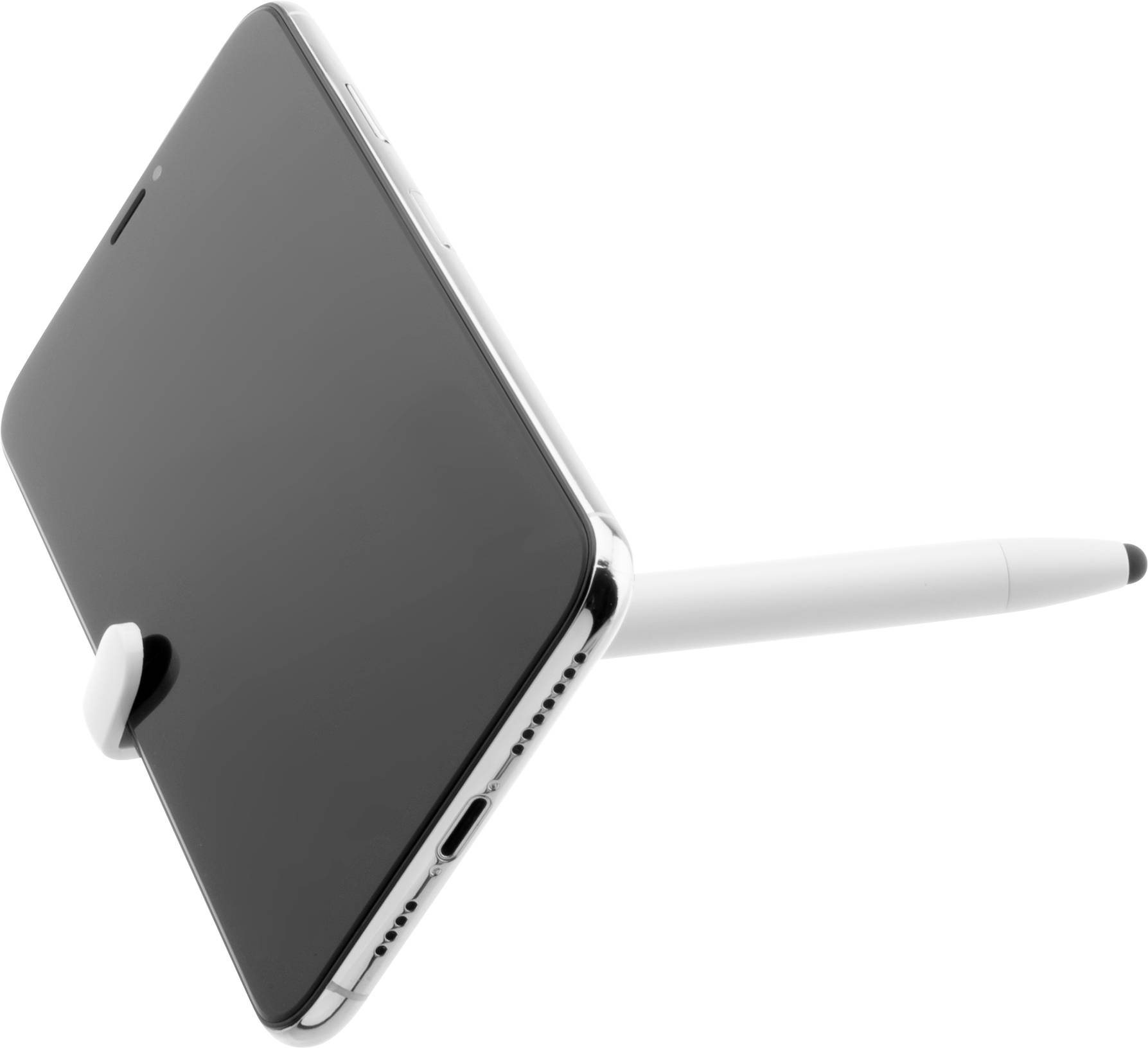 Smartfon w białym uchwycie na stole, podparty białym długopisem stylo.