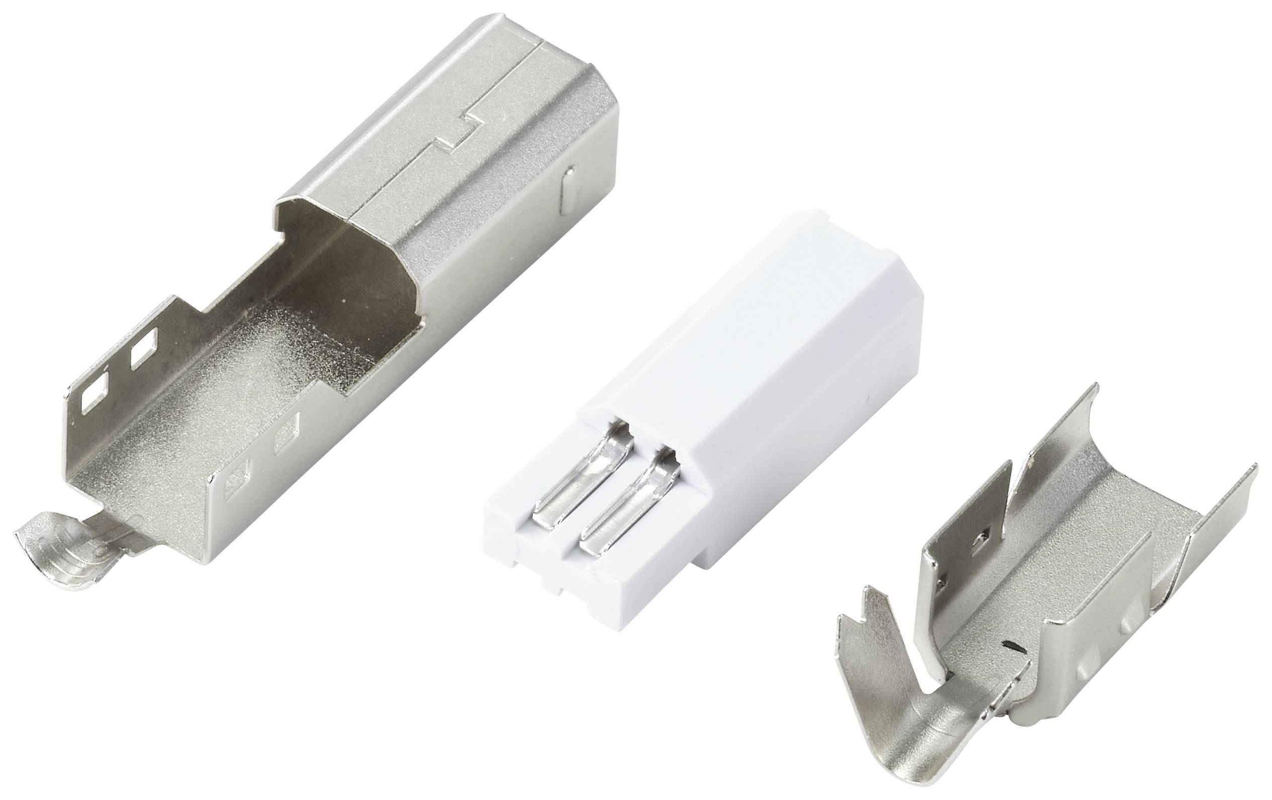 Elementy metalowe i plastikowe złącza elektrycznego rozłożone na części, na białym tle.