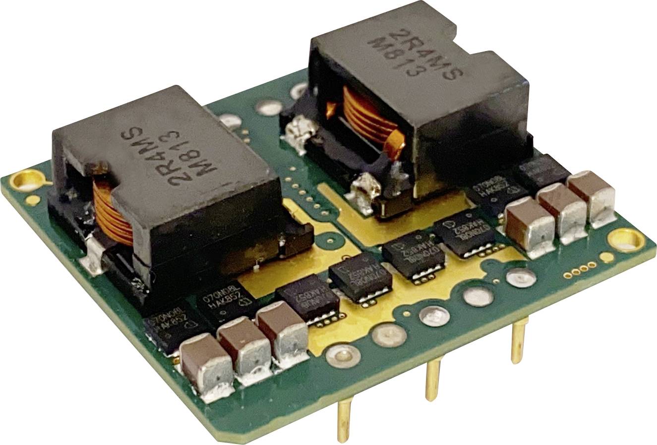 Zielona płytka drukowana z elementami elektronicznymi, w tym dwie czarne cewki oraz kilka kondensatorów i tranzystorów.