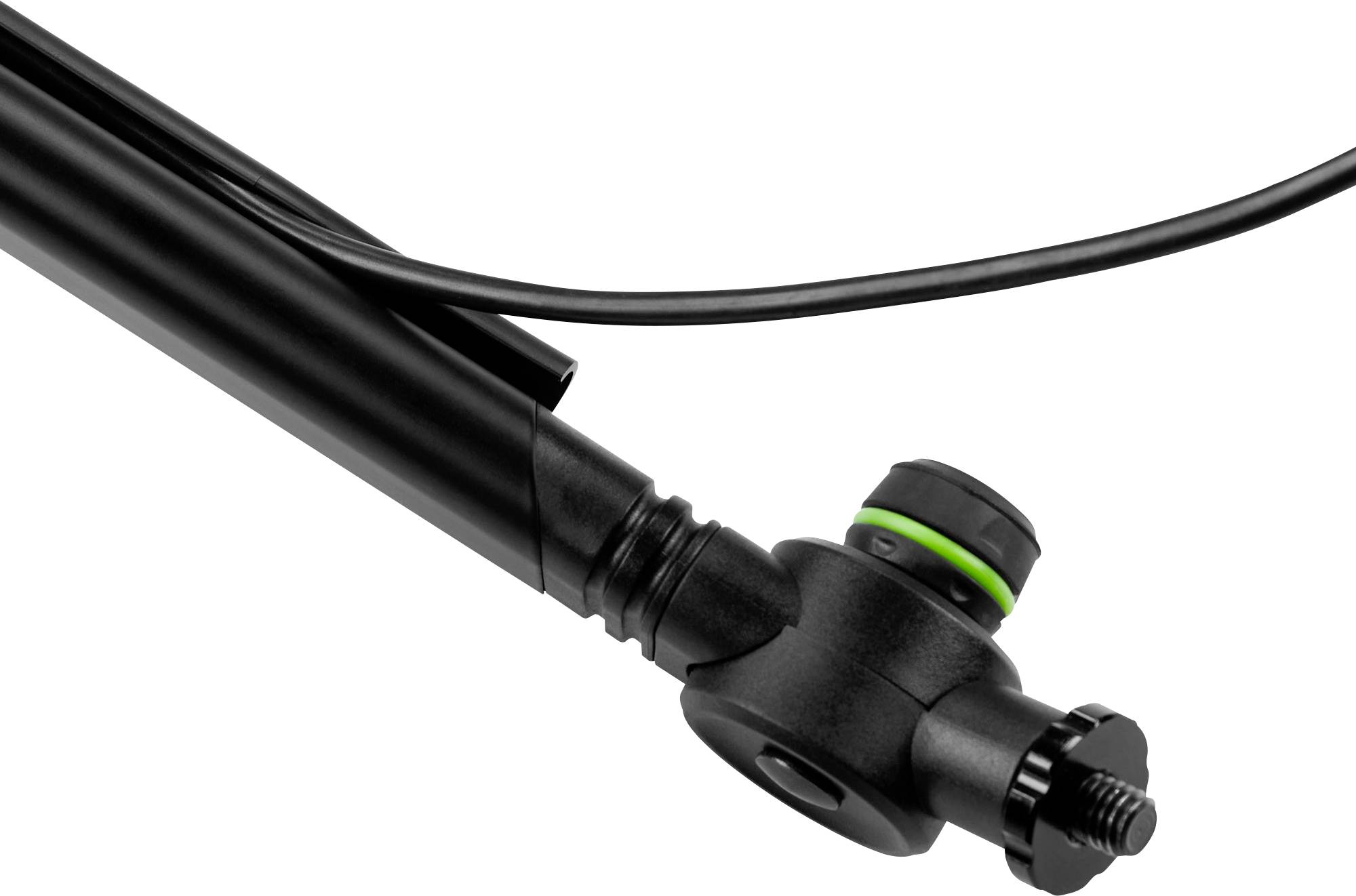 Czarne zawór rowerowy z pokrętłem regulacyjnym i zielonym pierścieniem. Kabel jest przymocowany do zaworu.