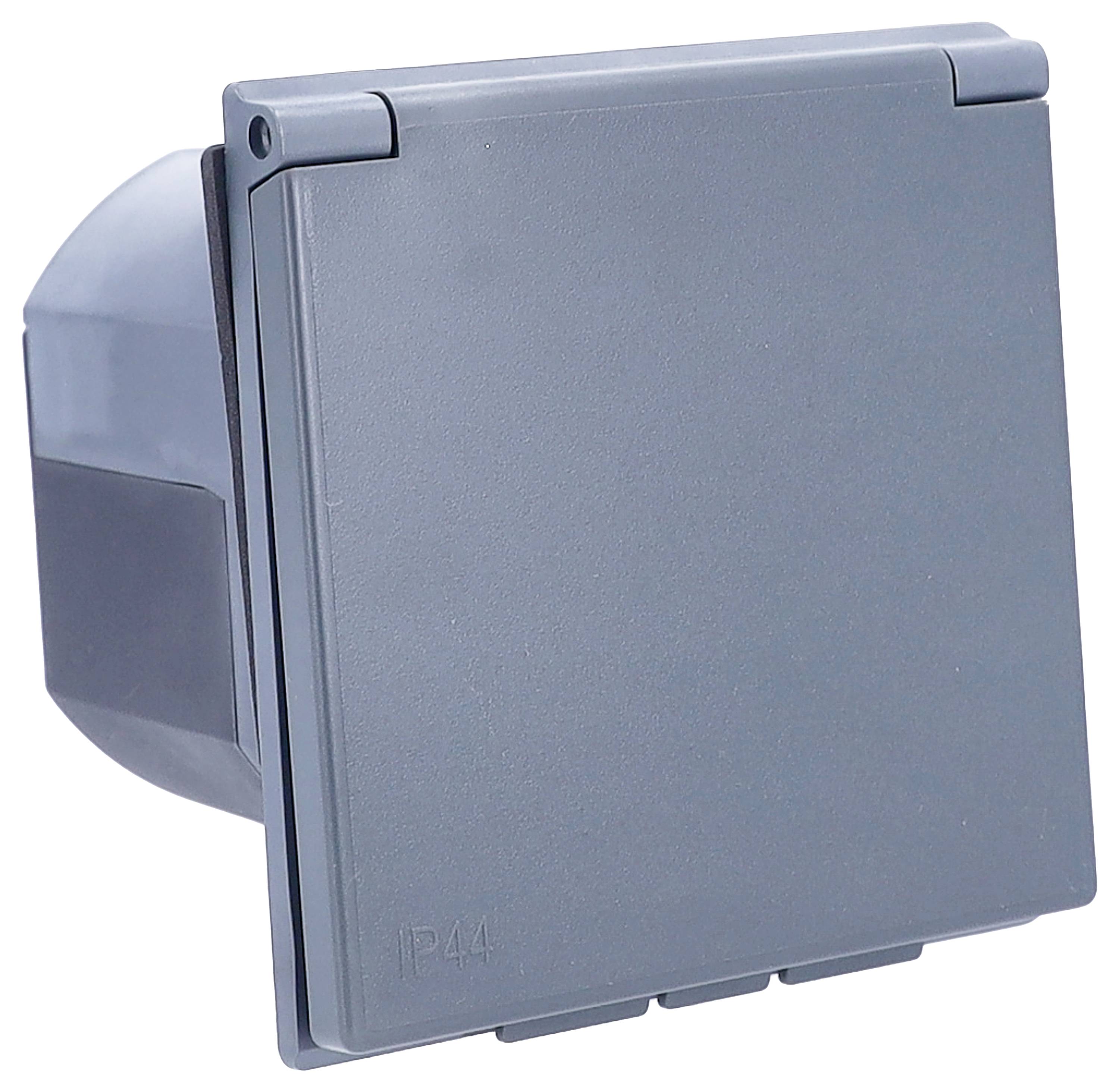 Szare gniazdko zewnętrzne z klapką i oznaczeniem 'IP44', odpowiednie do użytku na zewnątrz i chronione przed bryzgami wody.