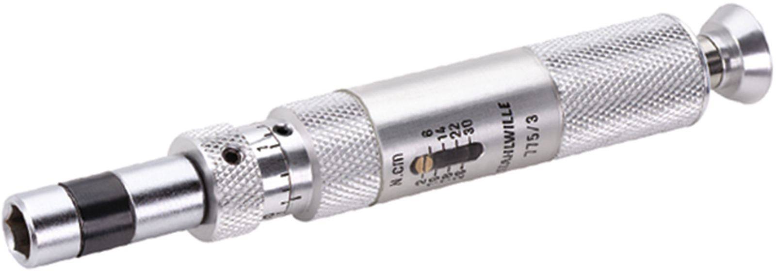 Srebrny klucz dynamometryczny ze wskaźnikiem skali do dokładnych ustawień, używany jest do precyzyjnego określania momentu obrotowego.