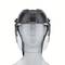 Kask ochronny z przyłbicą, transparentny i czarny, zamontowany na szarej formie głowy. Zapewnia ochronę twarzy w środowiskach pracy.