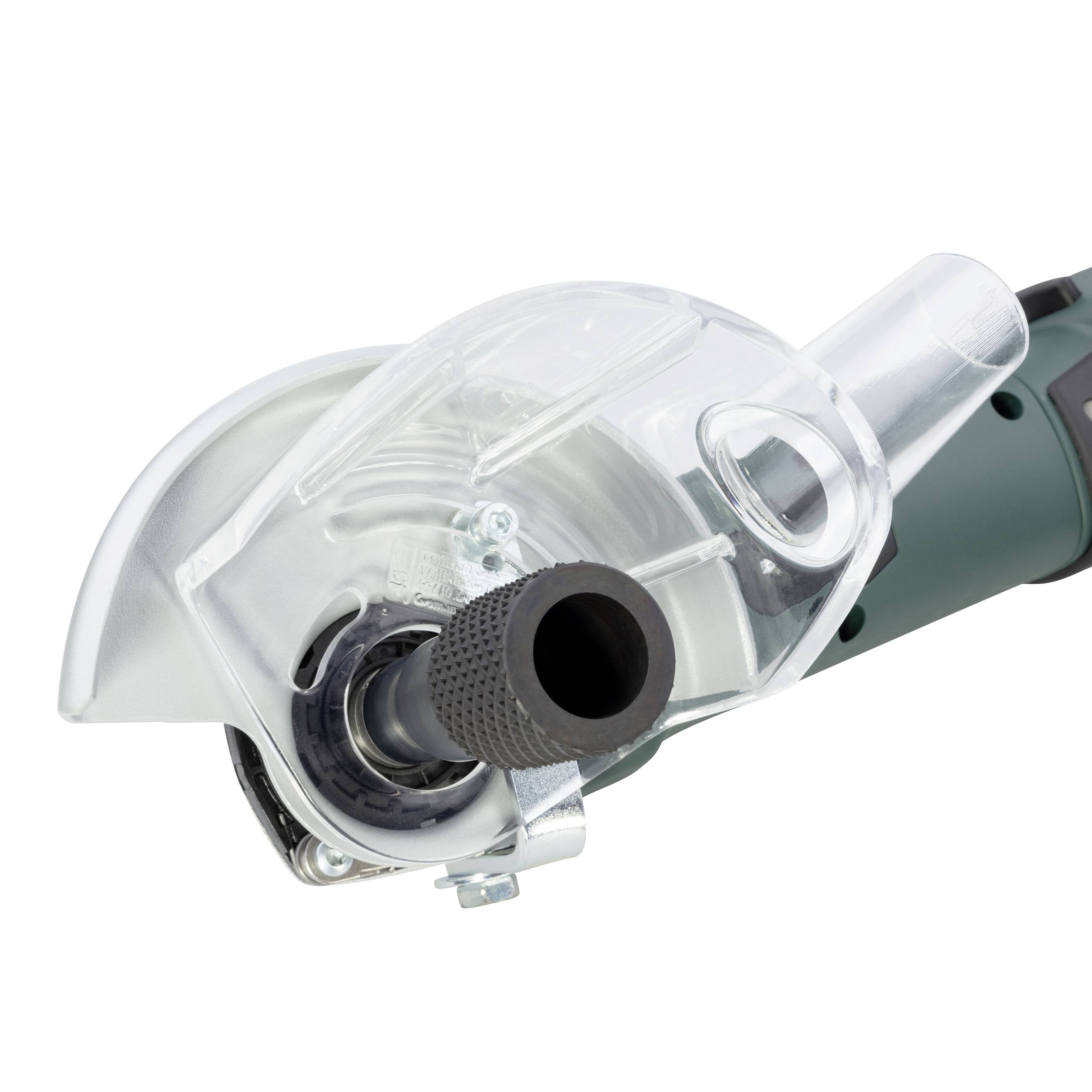 Zbliżenie kątnicy z osłoną przeciwpyłową i zielonym uchwytem, używanej do cięcia i szlifowania materiałów.