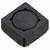 Kwadratowy, czarny element z okrągłym wgłębieniem pośrodku. Może być to część elektroniczna lub mechaniczna.