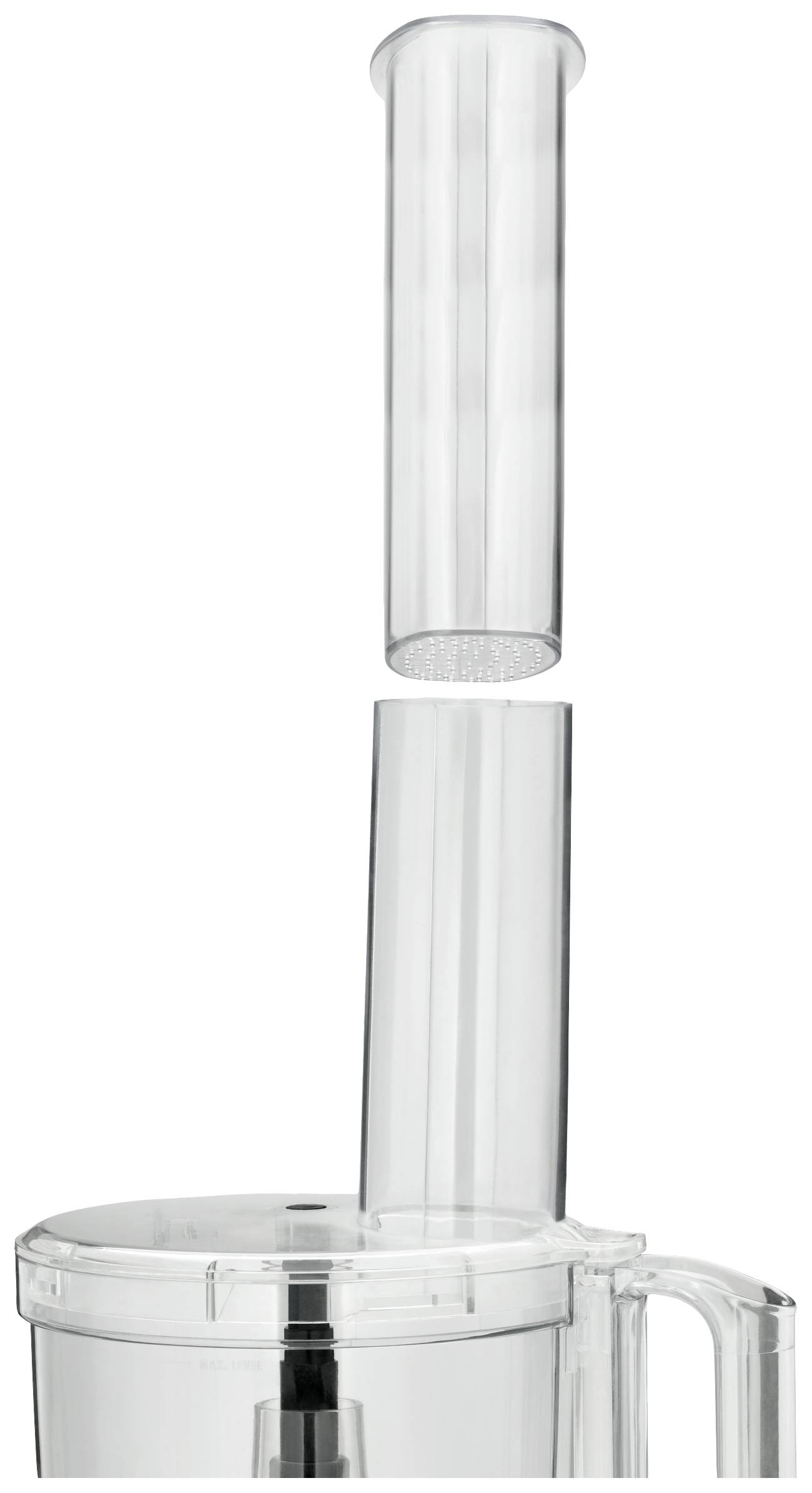 Przezroczysty cylinder jest pionowo wkładany do nasadki kuchennej.