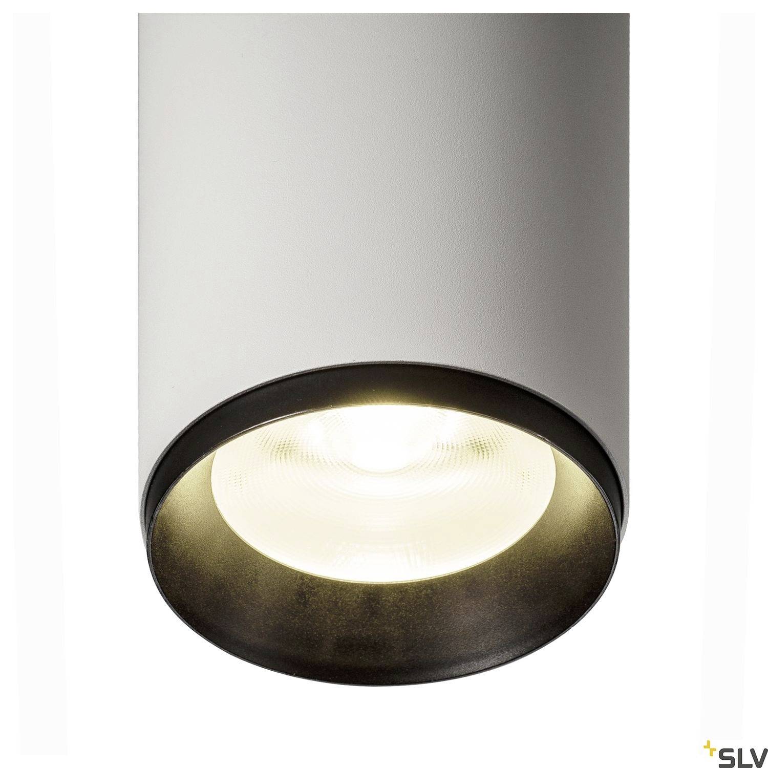 Okrągła, cylindryczna lampa sufitowa z czarną ramką i zintegrowanym źródłem światła, idealna do nowoczesnego oświetlenia wnętrz.