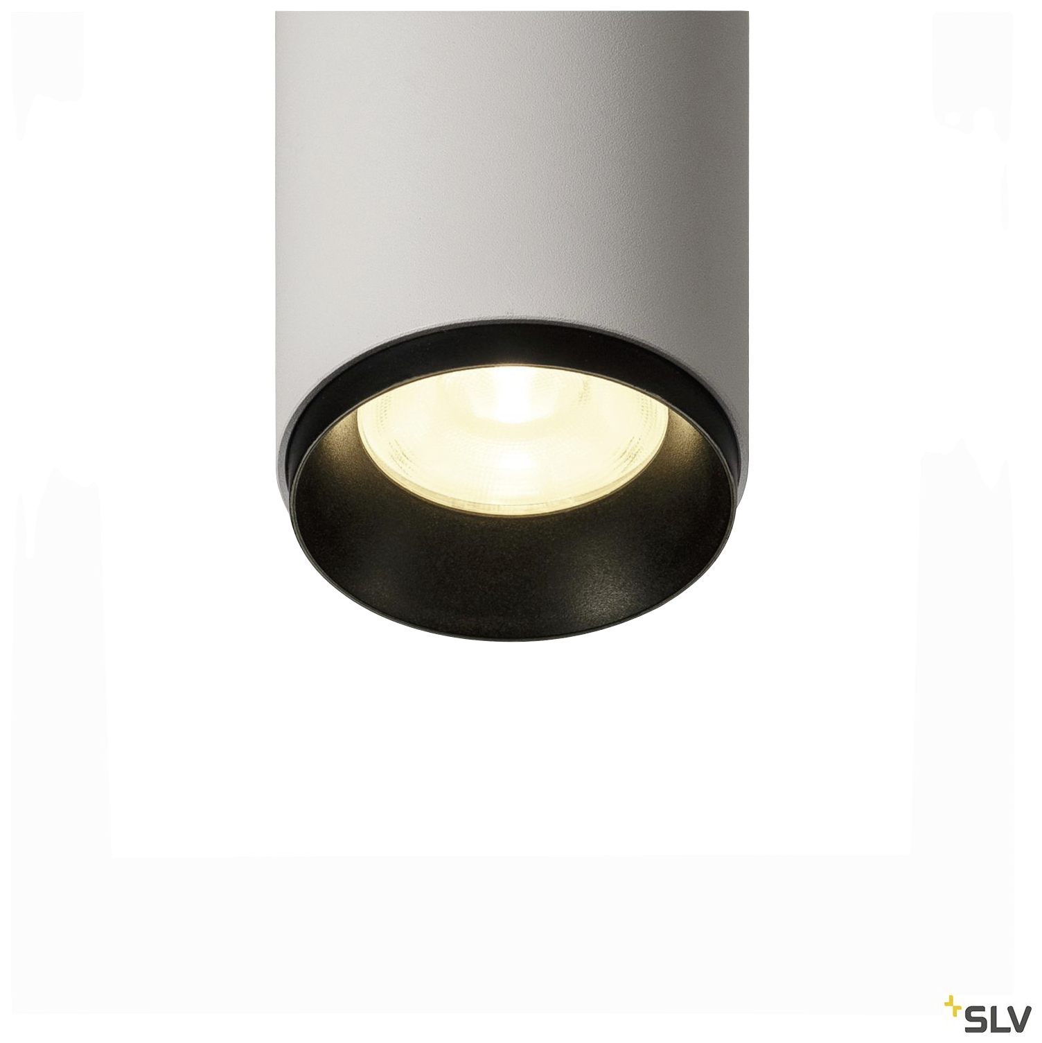 Lampa sufitowa z cylindryczną obudową, czarną krawędzią i widoczną żarówką, emitująca ciepłe światło. Idealna do nowoczesnych wnętrz.