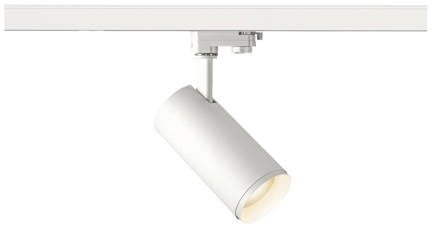 Biały, cylindryczny reflektor LED jest zamocowany na szynie i świeci do wnętrza pomieszczenia.