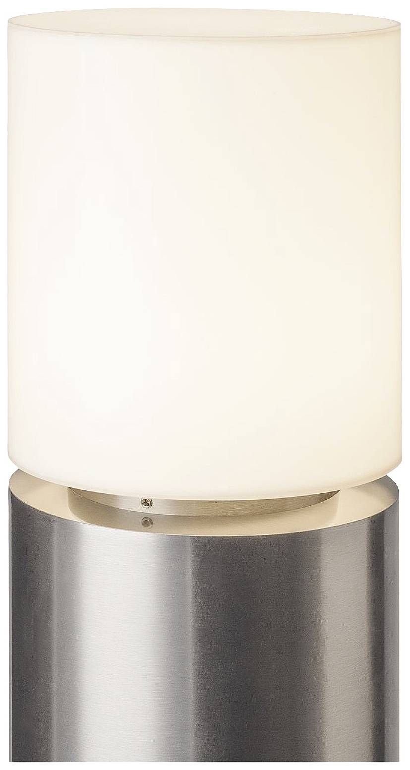 Lampa stołowa z cylindrycznym, matowym kloszem i metalową podstawą, emitująca miękkie, ciepłobiałe światło.