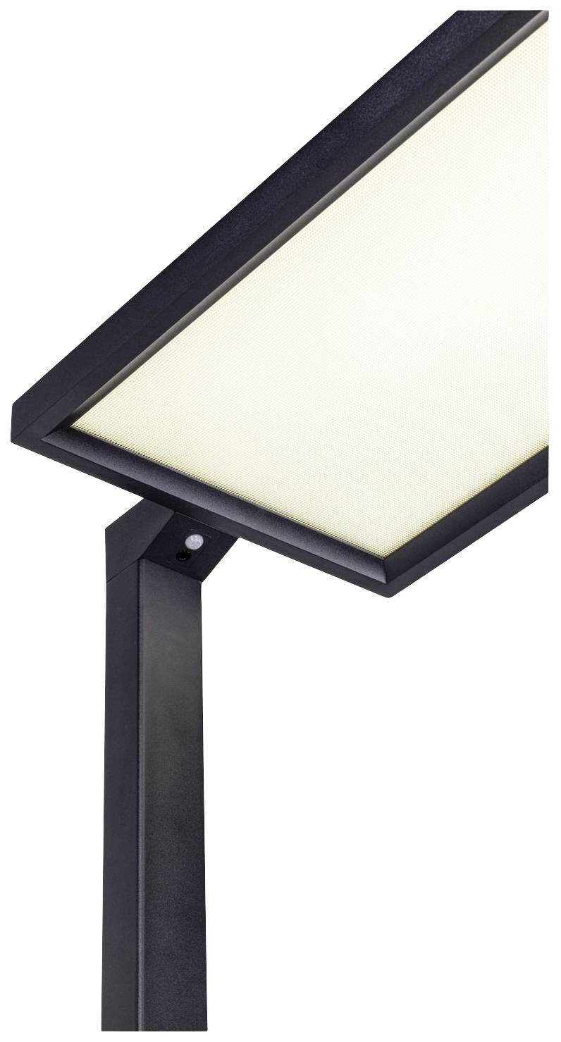 Nowoczesna lampa stojąca z kwadratową, obrotową głowicą wykonaną z czarnego metalu. Emituje mocne światło i doskonale nadaje się do oświetlania pomieszczeń.