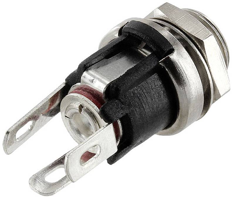 Metalowa tuleja z dwoma przyłączami, stosowana jako elektryczny złącz wtykowy na płytkach drukowanych lub w urządzeniach.