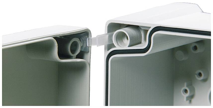 Dwa elektryczne elementy obudowy z ukrytym mechanizmem zawiasowym, który umożliwia bezszwowe połączenie.