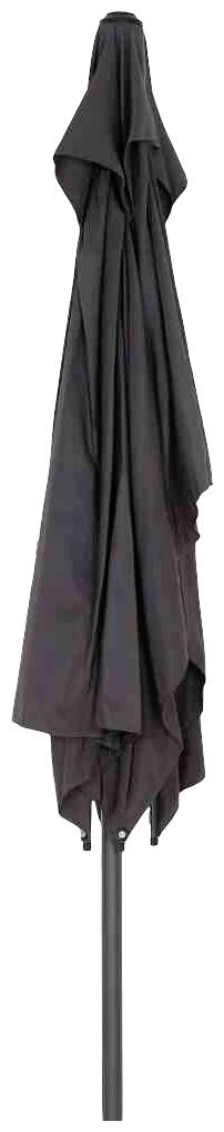 Pionowo stoi zamknięty, czarny parasol.