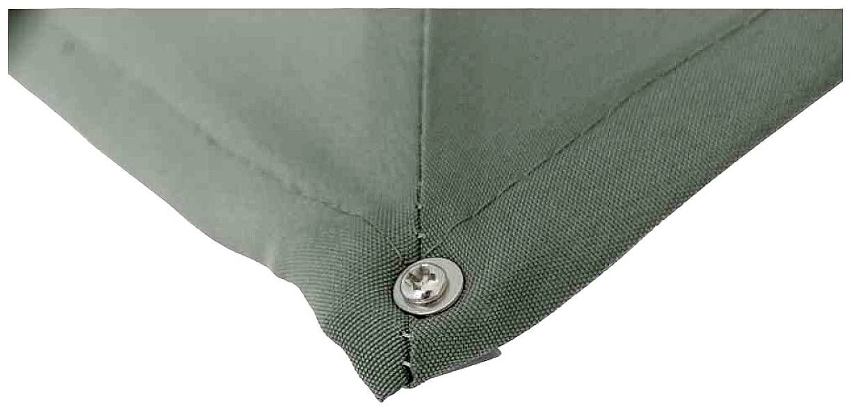 Zbliżenie na zieloną krawędź tkaniny z srebrną śrubą w rogu, która mocuje materiał.