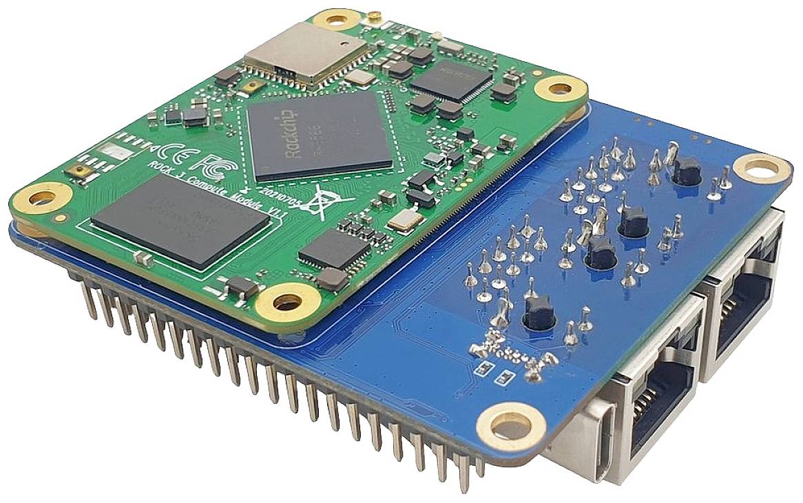 Zielona płytka drukowana z wieloma chipami i niebieskim modułem zawierającym porty Ethernet. Przeznaczona głównie do zastosowań technicznych.