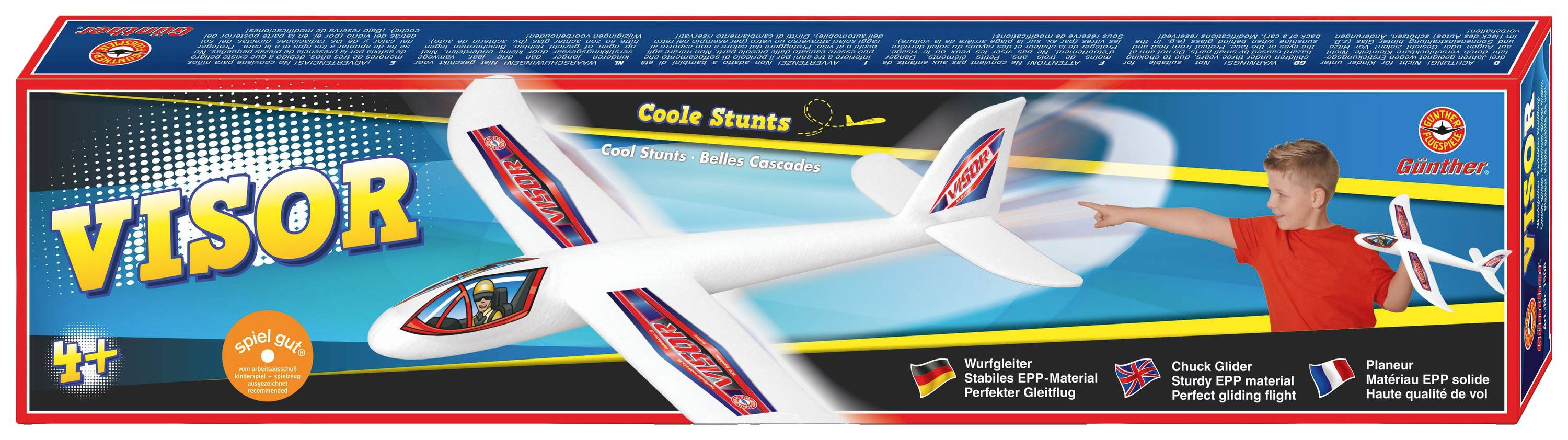 Zestaw modelu samolotu ze szybowcem w kolorowym opakowaniu. Chłopiec wskazuje na lecący model samolotu. Odpowiedni dla dzieci od 4 lat.