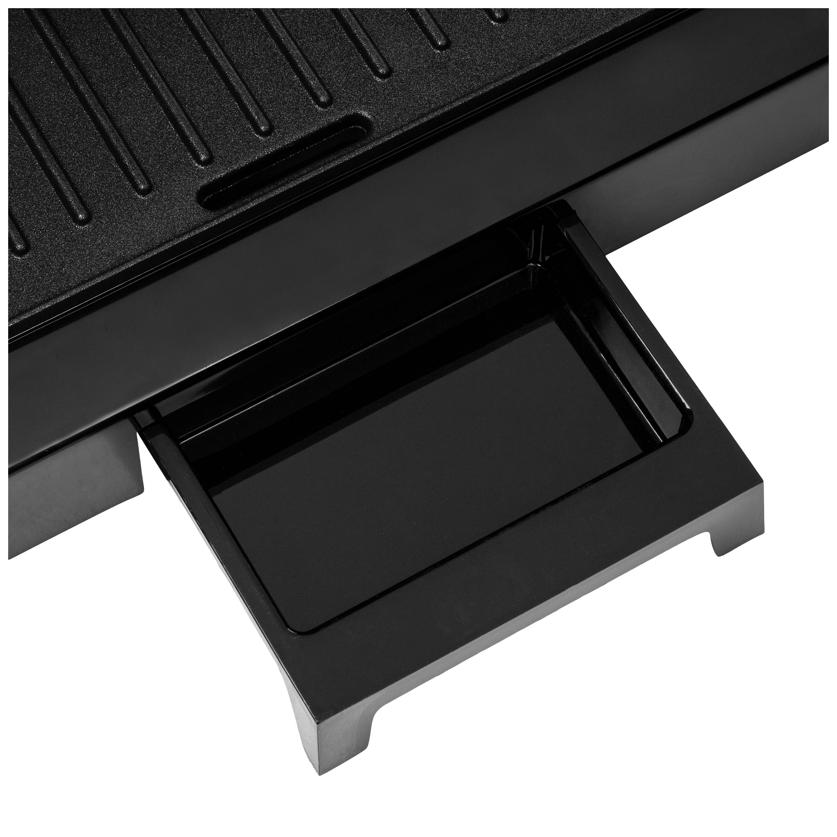 Czarny grill z wysuwaną tacką ociekową do zbierania tłuszczu lub płynów. Prosty design.