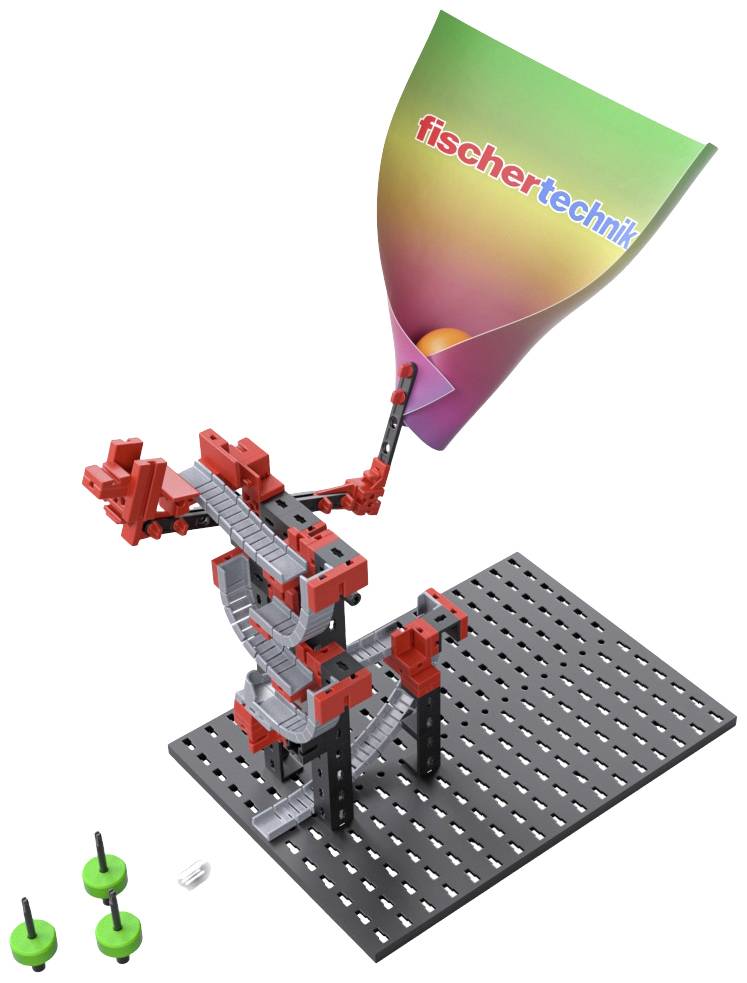 Model zbudowany z elementów Fischertechnik przedstawia spiralną zjeżdżalnię na czarnej płycie bazowej z dwoma zielonymi kołami zębatymi.
