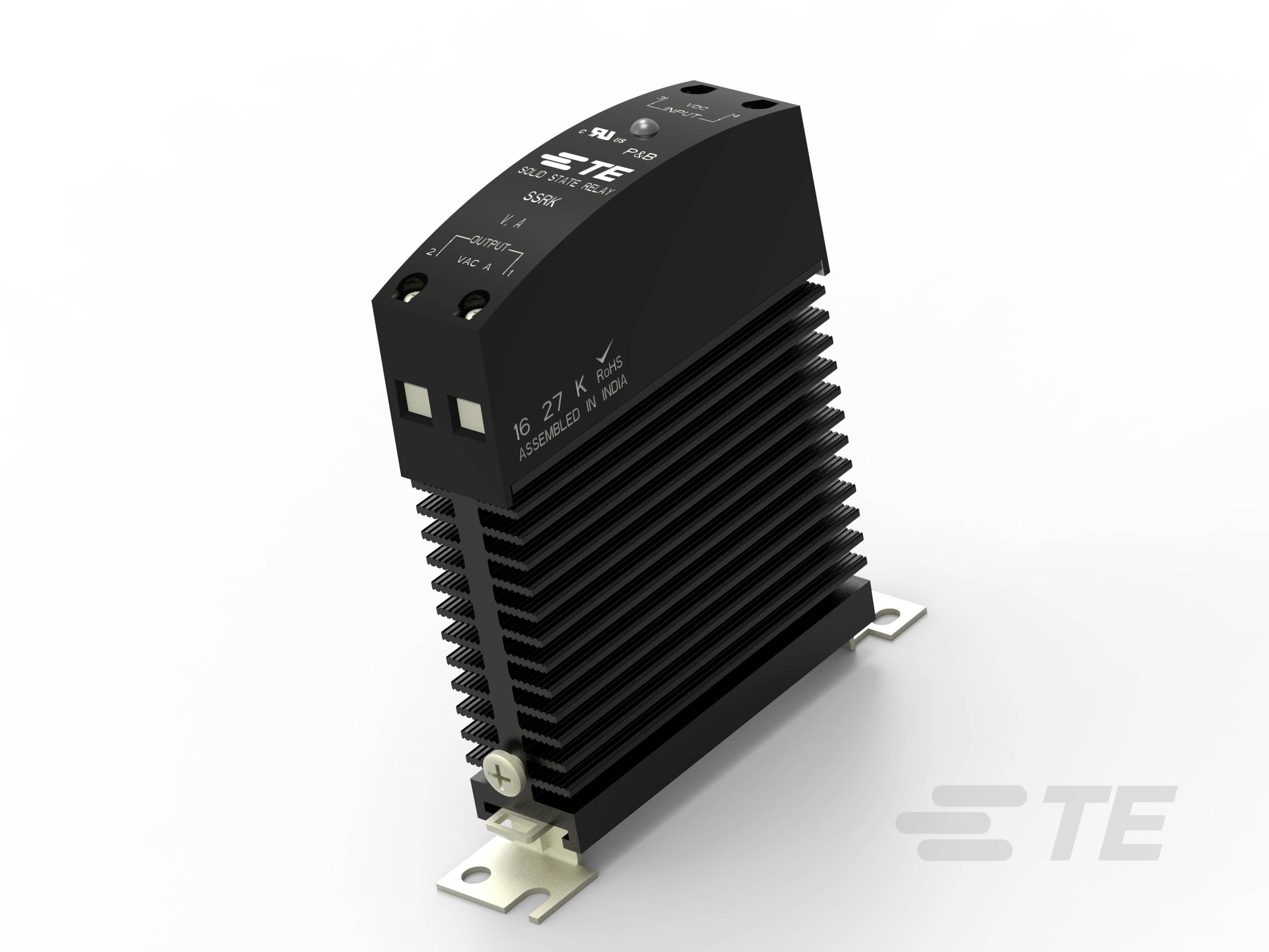 Czarno-szary element elektroniczny (przekaźnik półprzewodnikowy) z żeberkami chłodzącymi i logo marki. Odpowiedni do zastosowań przemysłowych.