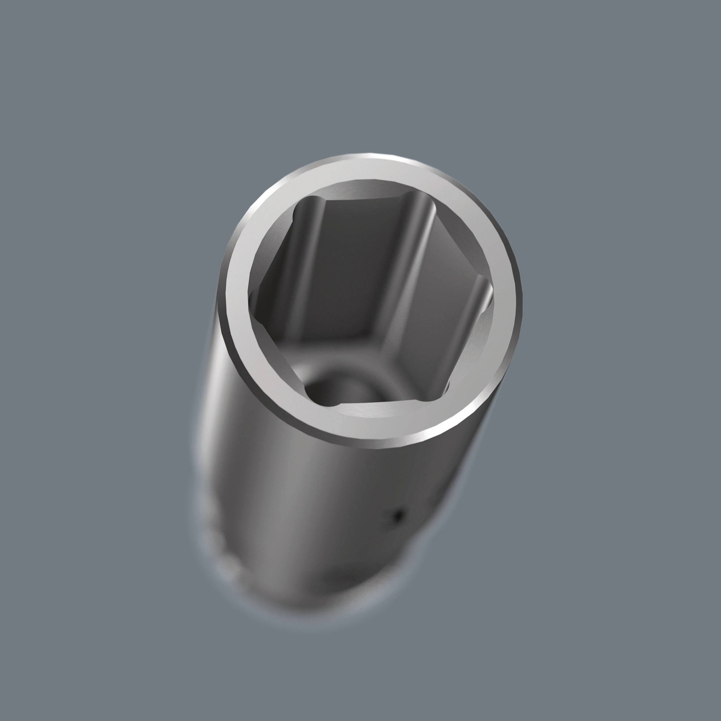 Sześciokątny adapter klucza nasadowego z metalu, widziany z perspektywy z góry, służący do obracania śrub sześciokątnych lub nakrętek.