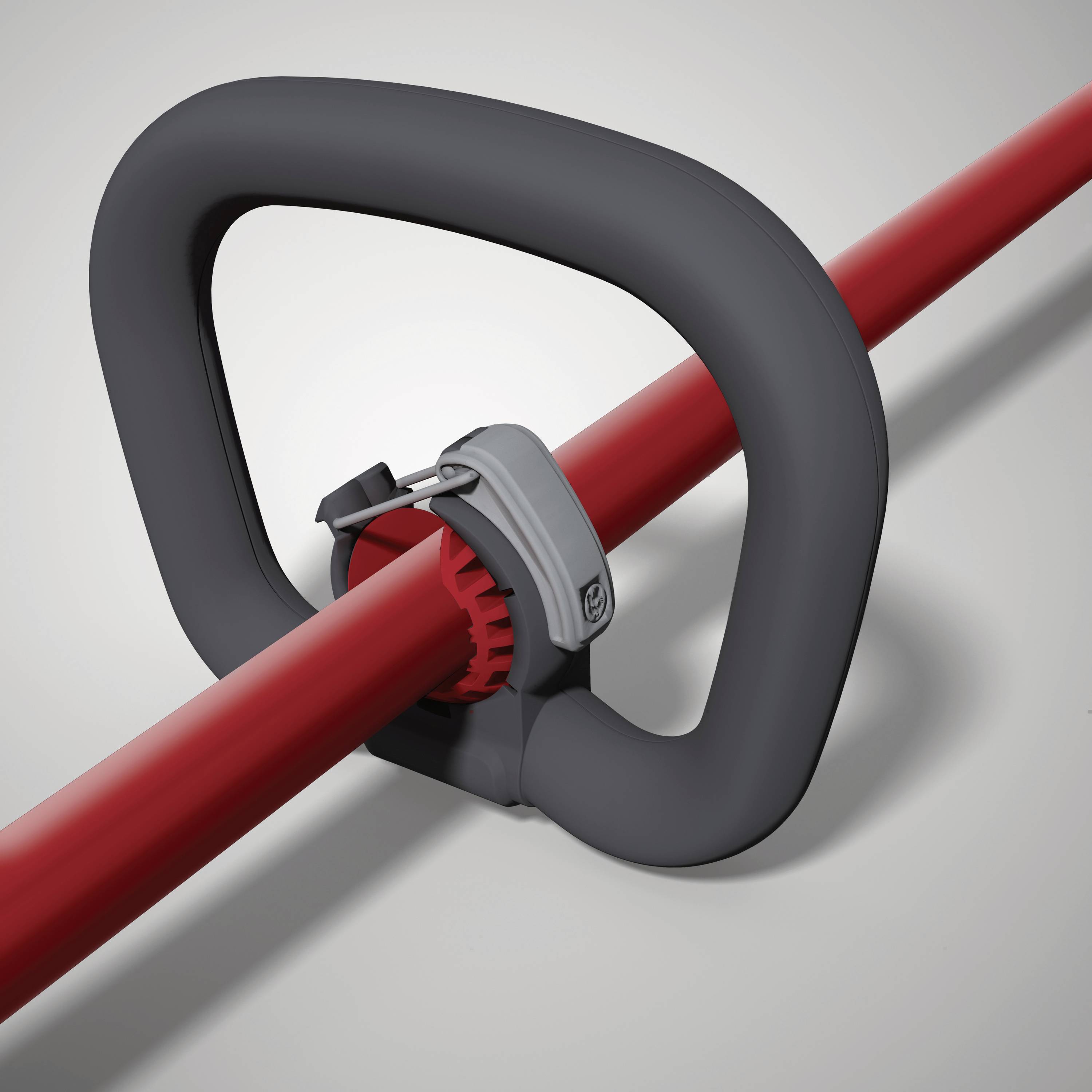 Czerwona rura z czarnym, ergonomicznym uchwytem i szarym zaciskiem mocującym.