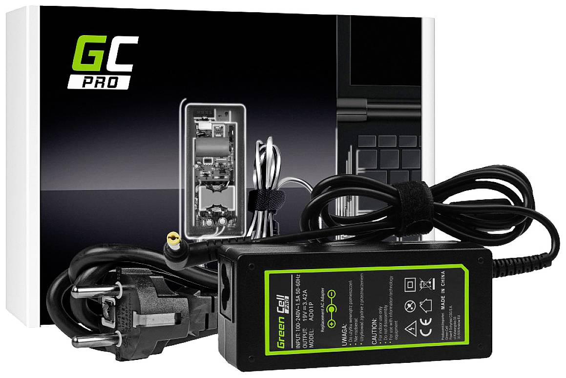 Ładowarka i kabel firmy Green Cell przed opakowaniem, które prezentuje notebook i szczegóły techniczne. Fokus skierowany jest na jednostkę ładującą.