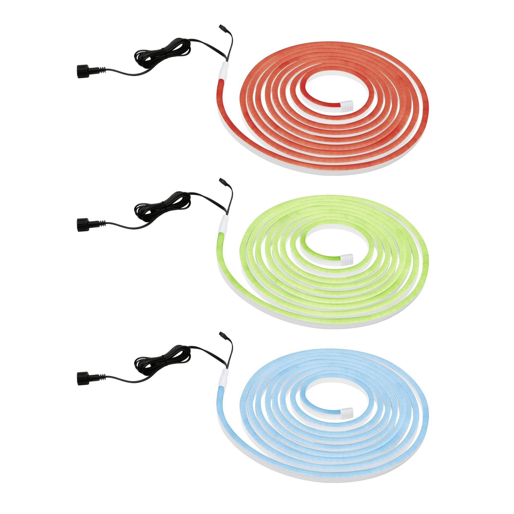 Trzy zwinięte świecące paski LED w kolorach czerwonym, zielonym i niebieskim, każdy z czarnym przewodem do podłączenia.