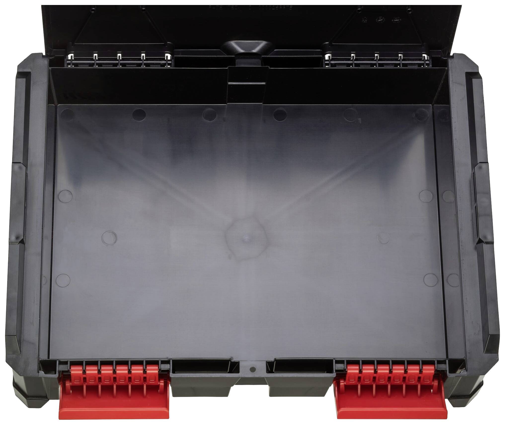 Czarna, pusta skrzynka narzędziowa z czerwonymi zatrzaskami, otwarta. Nie posiada przegródek ani narzędzi. Idealna do przechowywania.