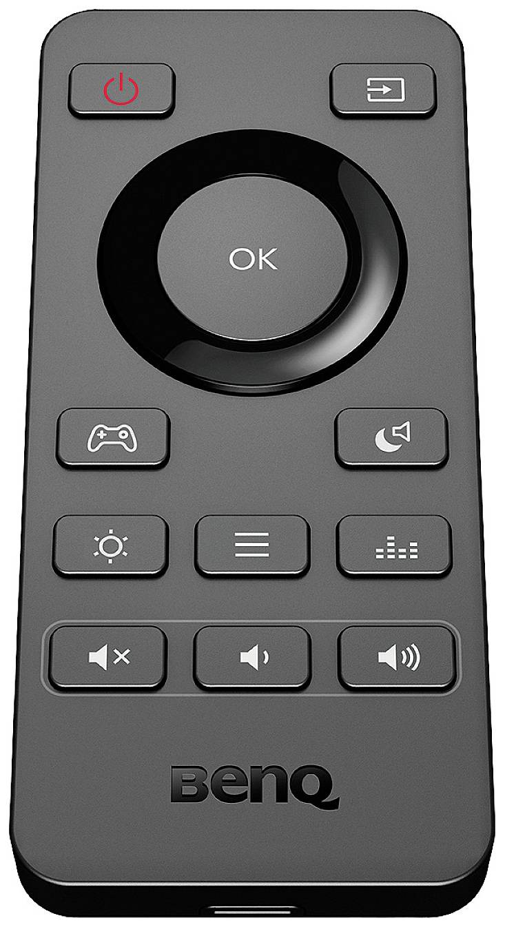 Czarna pilot zdalnego sterowania z centralnym przyciskiem 'OK', przyciskami głośności, jasności, menu i trybu gry. Oznaczony logo 'BenQ'.