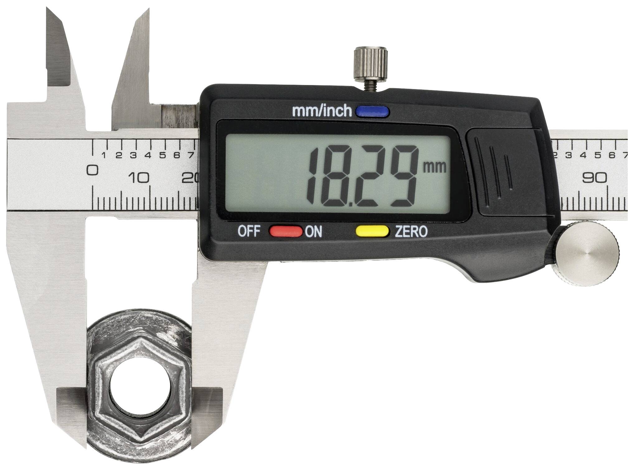 Cyfrowy suwmiarka zmierzyła średnicę nakrętki ze wskazaniem wartości 18,29 mm.