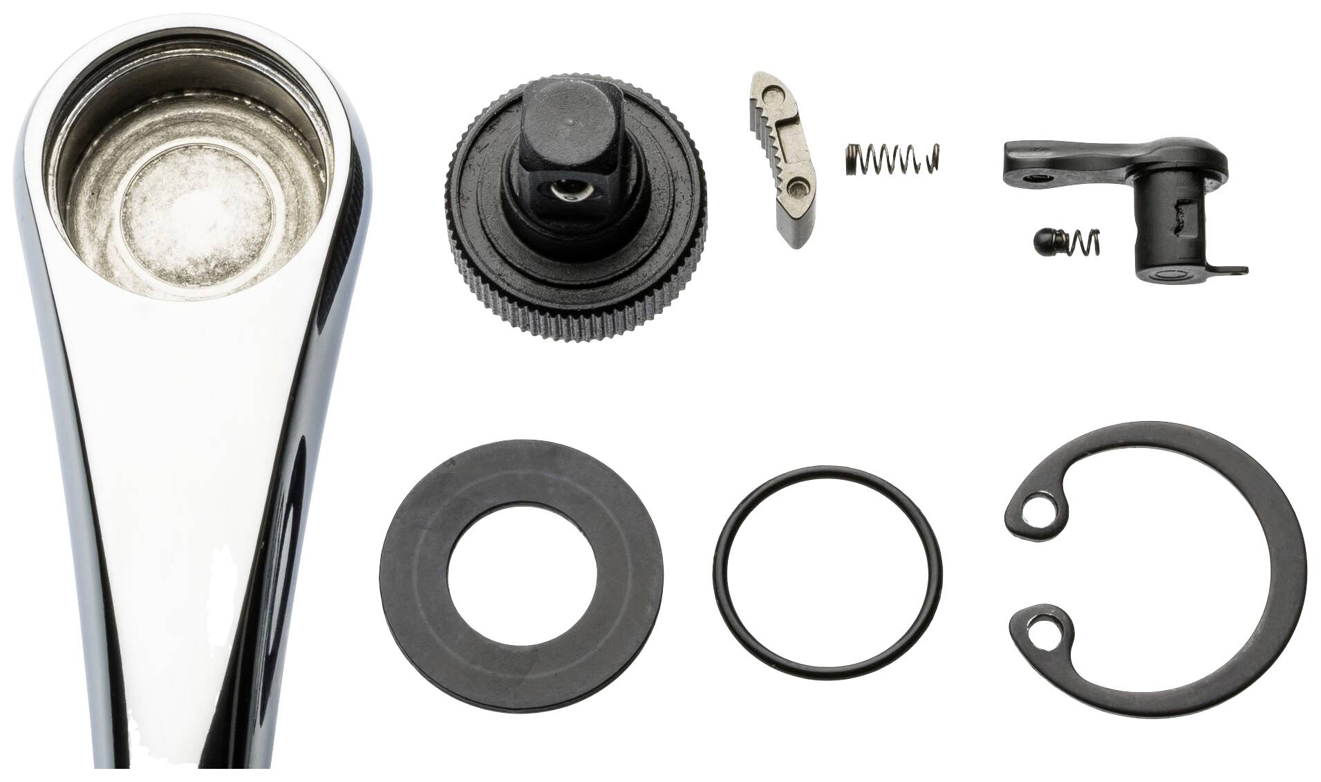 Rozebrany dźwignik przerzutki rowerowej, składający się z obudowy dźwigni, koła zębatego, uszczelnień gumowych, sprężyn oraz zabezpieczenia przed ściskaniem.