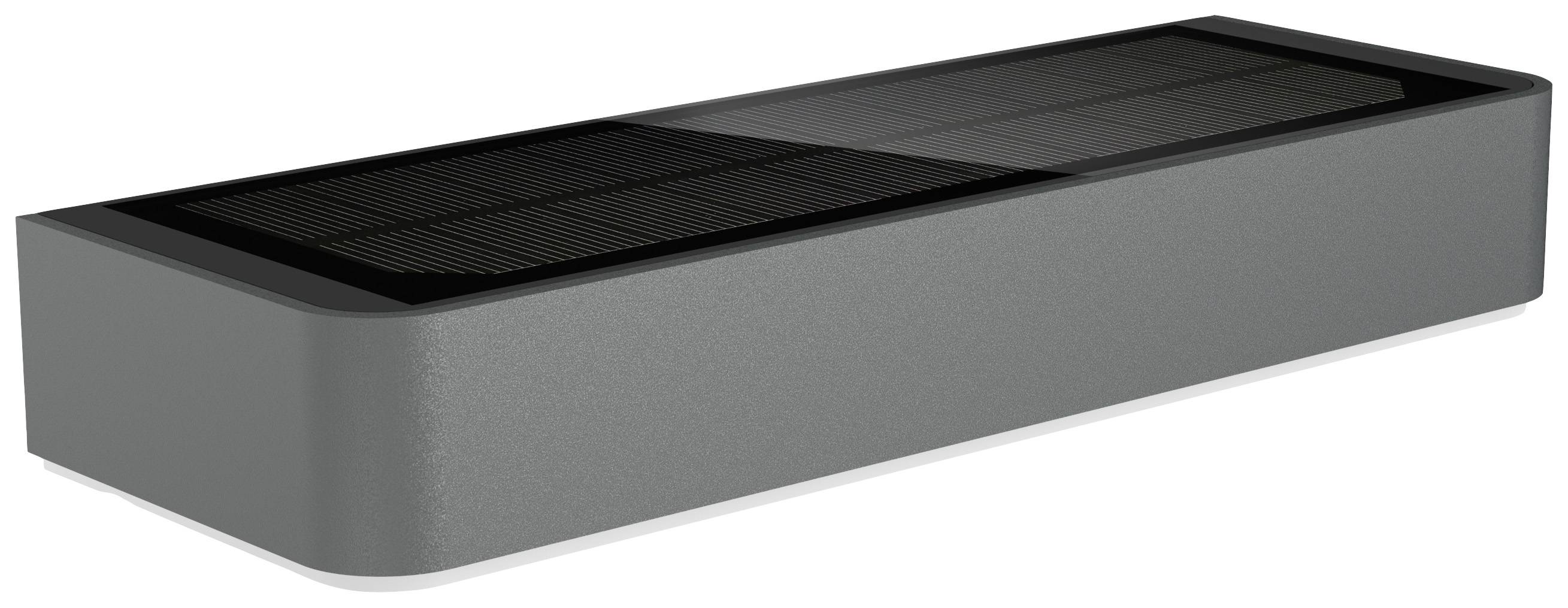 Prostokątny, błyszczący szary przedmiot o powierzchni przypominającej panele słoneczne. Może być częścią urządzenia lub akcesorium.