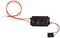 Czarny element elektroniczny z czerwonym i czarnym przewodem, prawdopodobnie mały czujnik lub przełącznik.