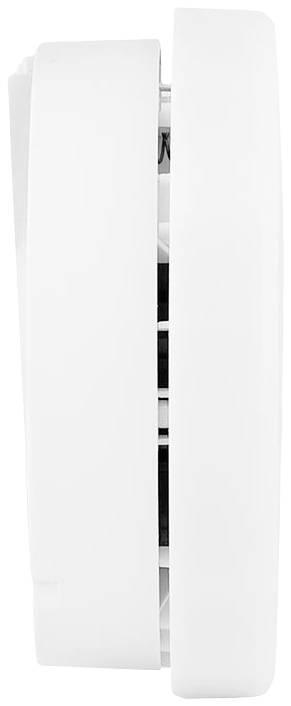 Biały czujnik dymu widziany z boku. Widoczne są szczeliny wentylacyjne i kompaktowa budowa.