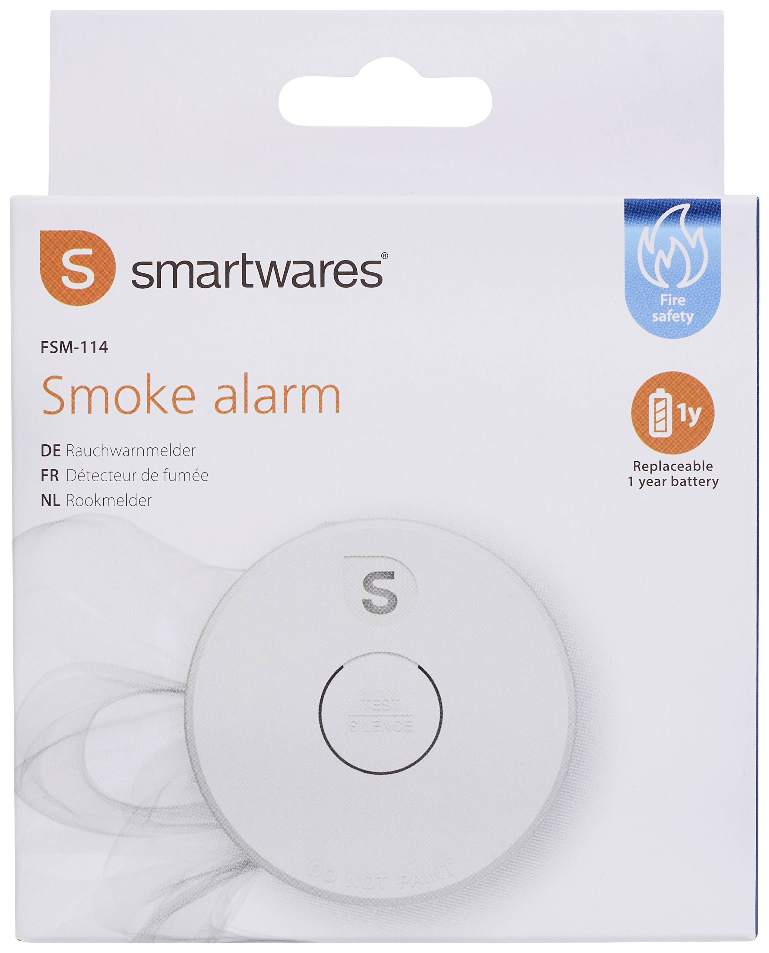 Opakowanie czujnika dymu marki 'smartwares' z wymienną baterią roczną. Tekst w kilku językach na przedniej stronie opakowania.