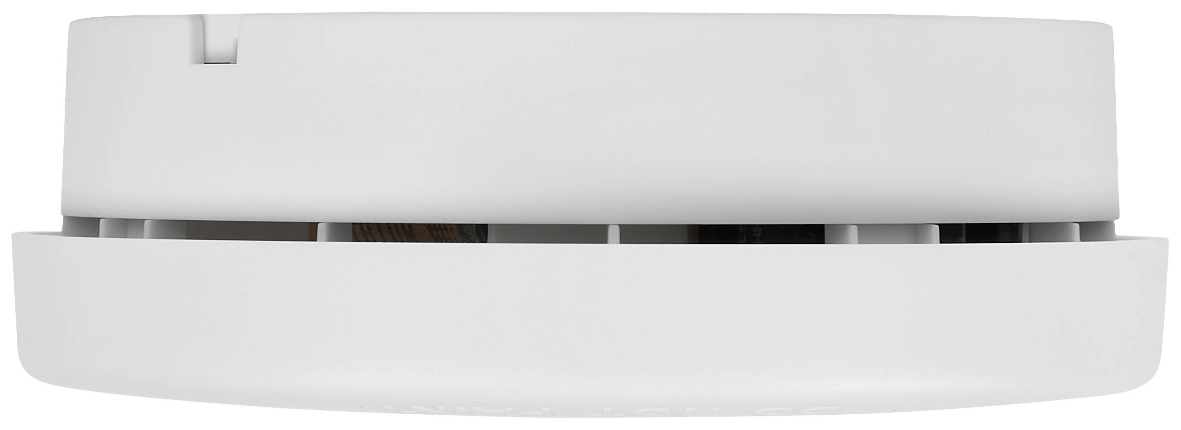 Biały czujnik dymu w kształcie cylindra, zamontowany na suficie.