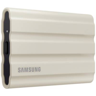 Zewnętrzny dysk twardy Samsung w falistej, piaskowej obudowie z gniazdem USB-C z boku.